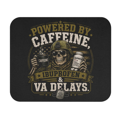Rectangular mouse pad with distressed skull, coffee mug, and pill bottle design, featuring "Powered by Caffeine" text and non-slip base
