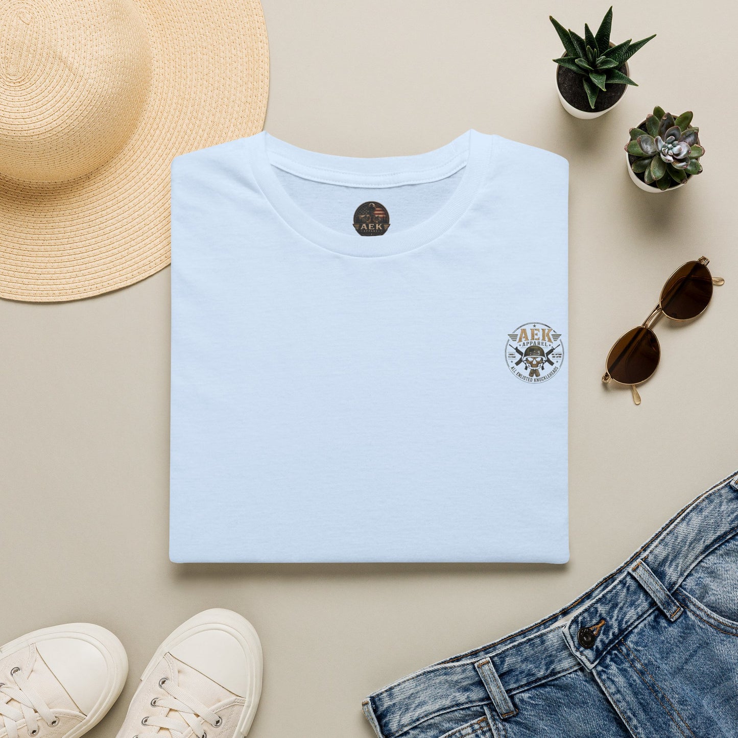 Army: Where You're Paid to Suffer T-Shirt — AEK Small Chest Logo, Coastal Surf Vibes
